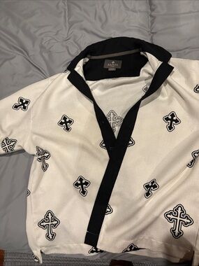 Men’s White Polo Shirt with Black Trim and Cross Motif